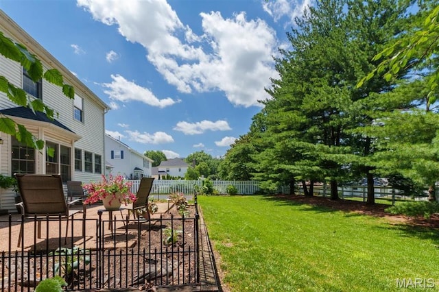 12429 Nicholas Ln, Saint Louis, MO 63131 - fenced backyard featuring a patio and a residential view
