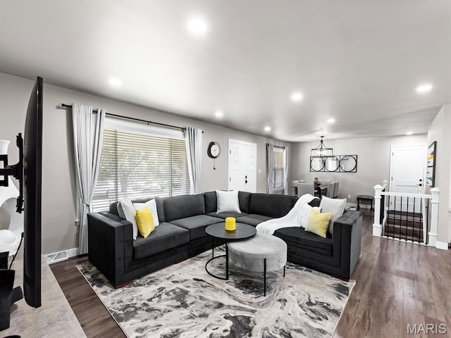 1201 Cheverly Ct, Saint Louis, MO 63146 - living room featuring dark wood finished floors and recessed lighting