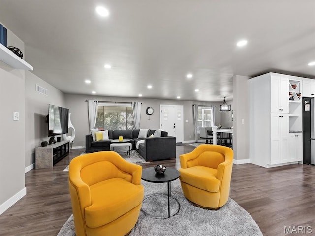 1201 Cheverly Ct, Saint Louis, MO 63146 - living room with dark wood-style floors and recessed lighting