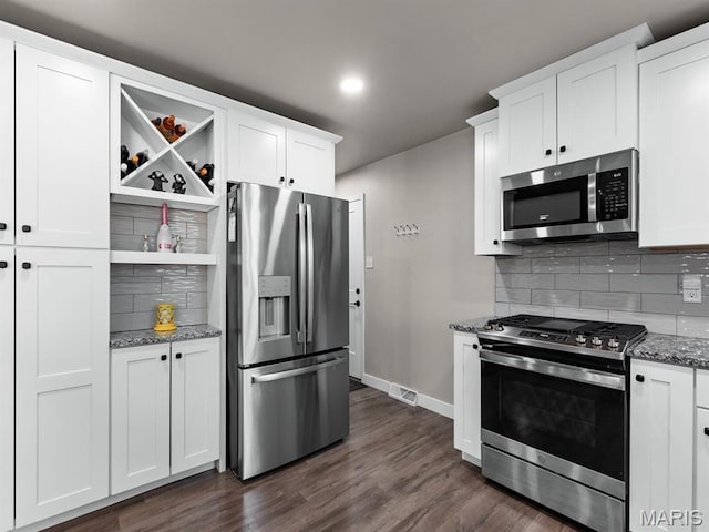1201 Cheverly Ct, Saint Louis, MO 63146 - kitchen with stainless steel appliances, open shelves, stone counters, tasteful backsplash, and dark wood-style floors