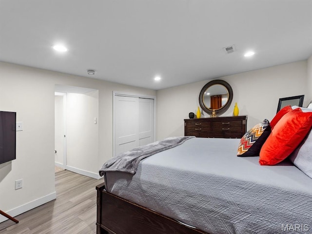1201 Cheverly Ct, Saint Louis, MO 63146 - bedroom with wood finished floors, recessed lighting, and a closet