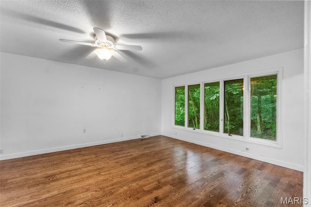 1938 State Highway Oo, Whitewater, MO 63785 - empty room with a textured ceiling, a ceiling fan, and wood finished floors