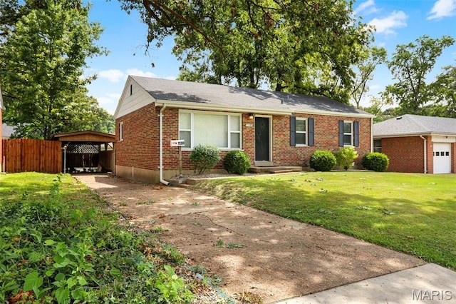 11380 Manchester Rd, Kirkwood, MO 63122 - view of front of property featuring brick siding, a carport, and concrete driveway