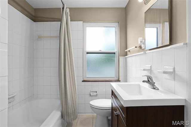 11380 Manchester Rd, Kirkwood, MO 63122 - full bathroom with vanity, shower / bath combo, tile walls, tile patterned flooring, and wainscoting