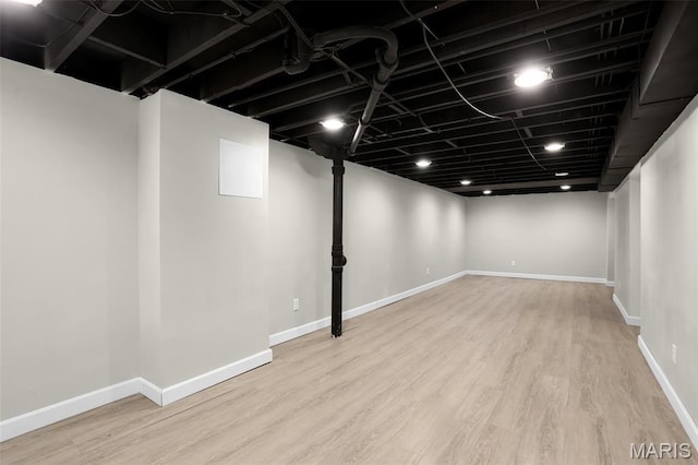 11380 Manchester Rd, Kirkwood, MO 63122 - finished below grade area with wood finished floors and baseboards