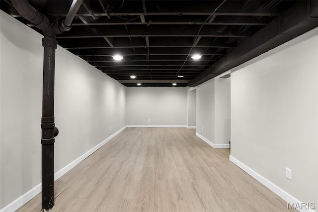 11380 Manchester Rd, Kirkwood, MO 63122 - finished below grade area featuring wood finished floors and baseboards