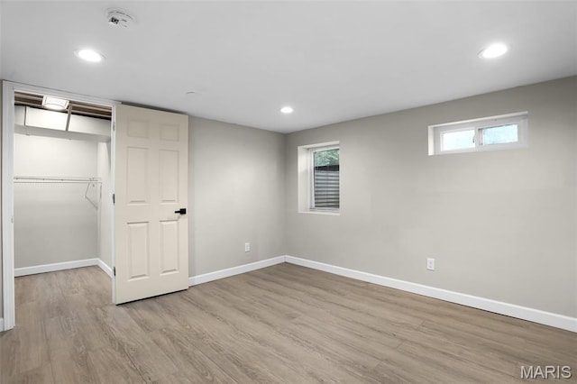 11380 Manchester Rd, Kirkwood, MO 63122 - unfurnished bedroom featuring light wood-style floors, recessed lighting, and a closet