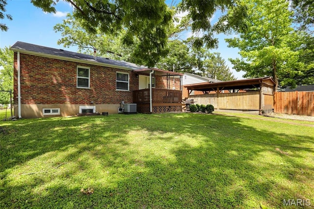 11380 Manchester Rd, Kirkwood, MO 63122 - back of house featuring a fenced backyard and brick siding