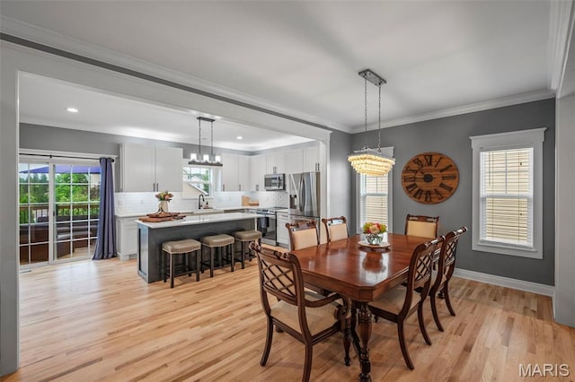 17108 Windsor Crest Blvd, Wildwood, MO 63038 - dining room featuring a chandelier, light wood-type flooring, ornamental molding, and recessed lighting