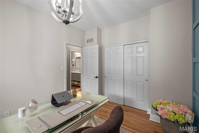 17108 Windsor Crest Blvd, Wildwood, MO 63038 - office with a chandelier and light wood-type flooring