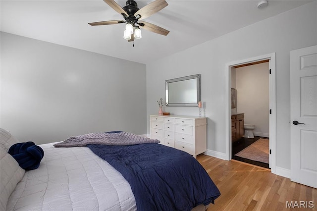 17108 Windsor Crest Blvd, Wildwood, MO 63038 - bedroom featuring light wood-type flooring, ensuite bathroom, and a ceiling fan