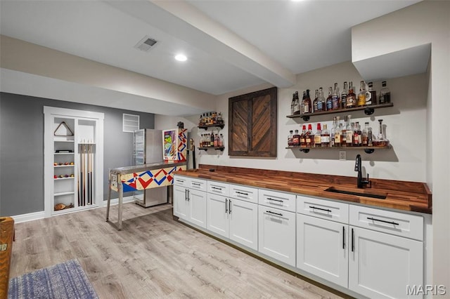 17108 Windsor Crest Blvd, Wildwood, MO 63038 - indoor wet bar with light wood-style floors and recessed lighting