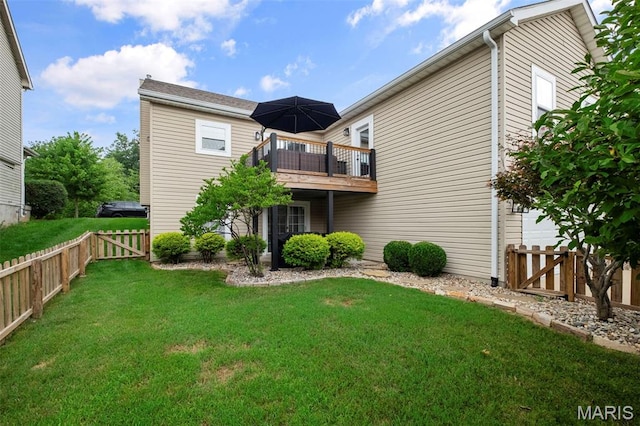 17108 Windsor Crest Blvd, Wildwood, MO 63038 - rear view of house featuring a fenced backyard and a wooden deck