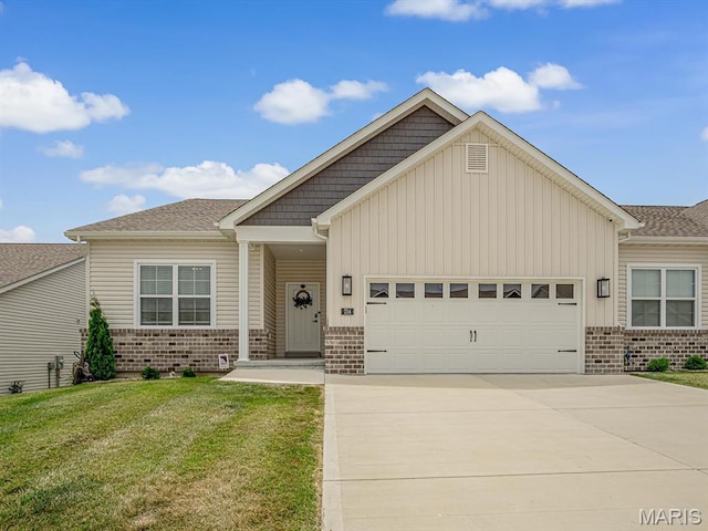 714 Applewood Creek Dr, Fairview Heights, IL 62208 - view of front of property featuring brick siding, a garage, board and batten siding, and a front yard