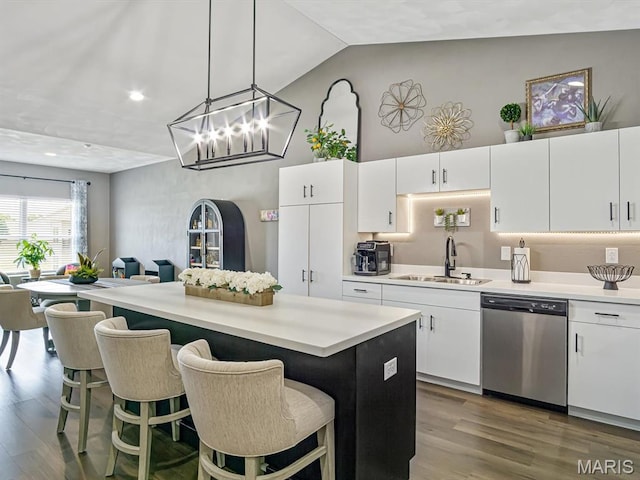 714 Applewood Creek Dr, Fairview Heights, IL 62208 - kitchen with dishwasher, wood finished floors, open floor plan, light countertops, and lofted ceiling