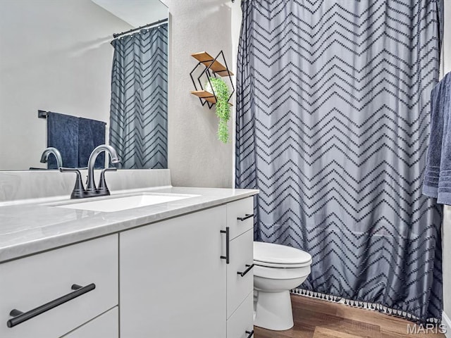 714 Applewood Creek Dr, Fairview Heights, IL 62208 - full bath with a textured wall, vanity, wood finished floors, and a shower with shower curtain