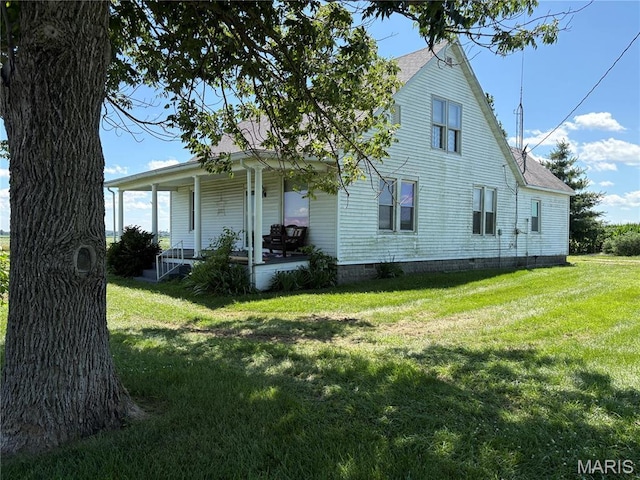 98 SW 200th Ave, Carrollton, IL 62016 - view of side of property with a porch, a yard, and crawl space
