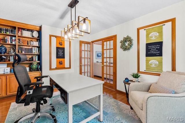 218 W Stonybrook Dr, Ofallon, IL 62269 - office area featuring french doors and wood finished floors