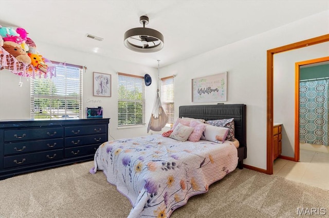 218 W Stonybrook Dr, Ofallon, IL 62269 - bedroom with light colored carpet and light tile patterned flooring