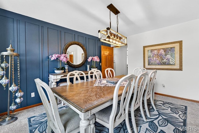 218 W Stonybrook Dr, Ofallon, IL 62269 - dining area with light colored carpet and a decorative wall