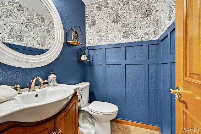 218 W Stonybrook Dr, Ofallon, IL 62269 - half bath featuring vanity, tile patterned flooring, a decorative wall, and a textured wall