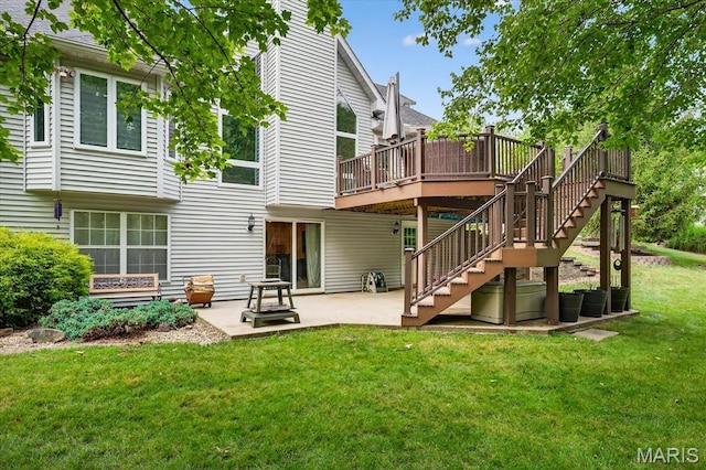 218 W Stonybrook Dr, Ofallon, IL 62269 - back of property featuring a lawn, stairway, a patio, and a deck