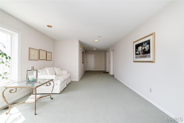 1632 Lake Knoll Dr Unit 1P, Lake St Louis, MO 63367 - living area with light carpet and plenty of natural light