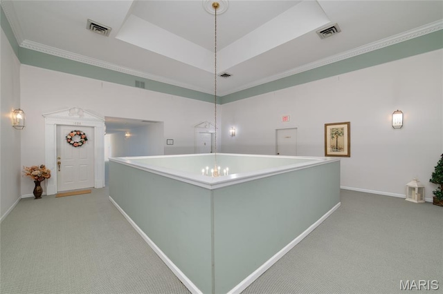 1632 Lake Knoll Dr Unit 1P, Lake St Louis, MO 63367 - hall featuring light colored carpet, a raised ceiling, and crown molding