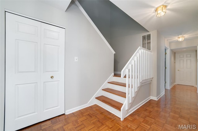 1632 Lake Knoll Dr Unit 1P, Lake St Louis, MO 63367 - staircase featuring baseboards