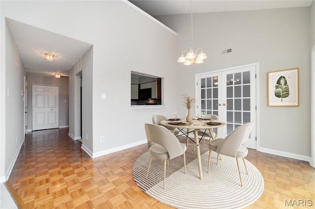 1632 Lake Knoll Dr Unit 1P, Lake St Louis, MO 63367 - dining room with a high ceiling, a chandelier, and french doors