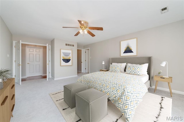 1632 Lake Knoll Dr Unit 1P, Lake St Louis, MO 63367 - bedroom featuring light carpet and ceiling fan