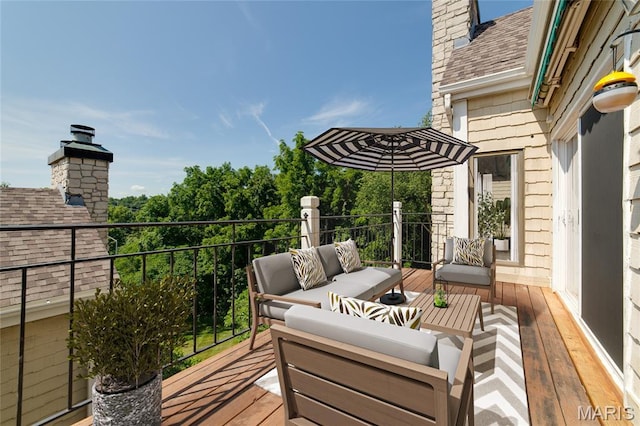 1632 Lake Knoll Dr Unit 1P, Lake St Louis, MO 63367 - wooden terrace with outdoor lounge area