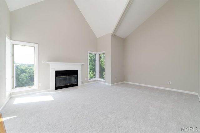 1632 Lake Knoll Dr Unit 1P, Lake St Louis, MO 63367 - unfurnished living room with light carpet, a fireplace with flush hearth, and high vaulted ceiling