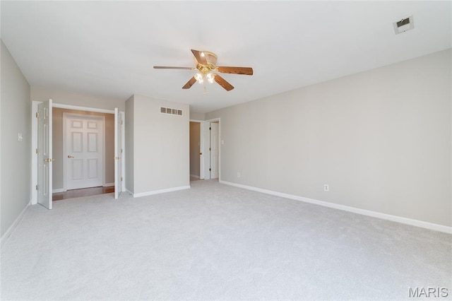 1632 Lake Knoll Dr Unit 1P, Lake St Louis, MO 63367 - unfurnished bedroom with light colored carpet and a ceiling fan