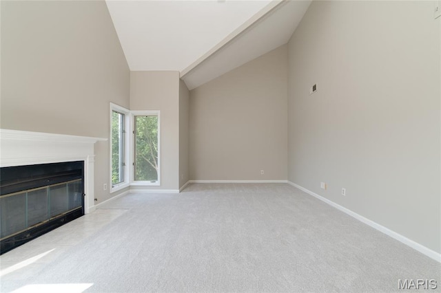 1632 Lake Knoll Dr Unit 1P, Lake St Louis, MO 63367 - unfurnished living room featuring carpet, a fireplace with flush hearth, and high vaulted ceiling
