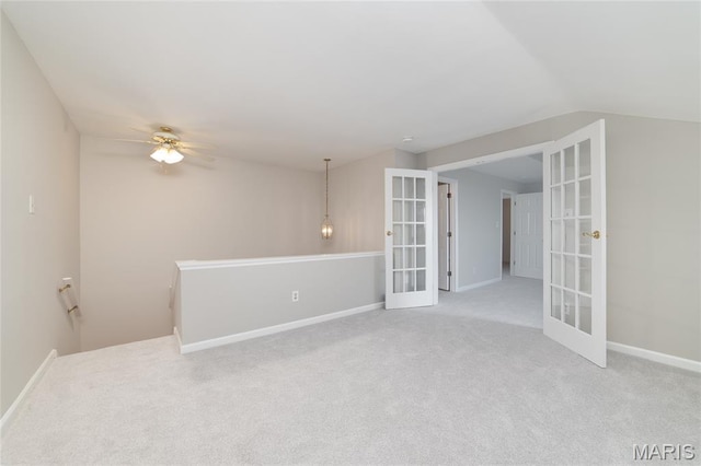 1632 Lake Knoll Dr Unit 1P, Lake St Louis, MO 63367 - carpeted empty room featuring french doors, vaulted ceiling, and ceiling fan