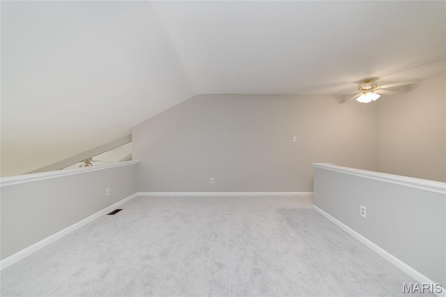 1632 Lake Knoll Dr Unit 1P, Lake St Louis, MO 63367 - bonus room featuring a ceiling fan, lofted ceiling, and carpet