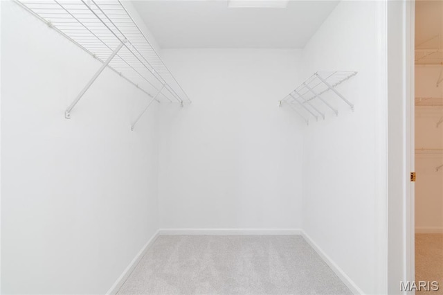 1632 Lake Knoll Dr Unit 1P, Lake St Louis, MO 63367 - spacious closet featuring light colored carpet