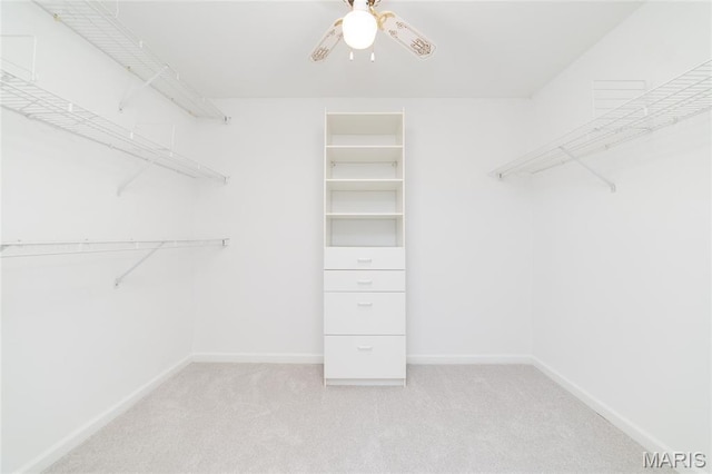 1632 Lake Knoll Dr Unit 1P, Lake St Louis, MO 63367 - walk in closet featuring carpet and a ceiling fan