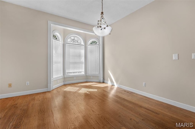 1805 Lincoln Knolls Dr, Edwardsville, IL 62025 - spare room featuring wood finished floors