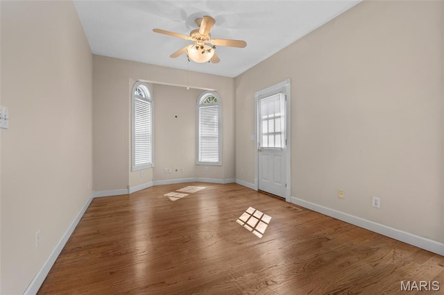 1805 Lincoln Knolls Dr, Edwardsville, IL 62025 - spare room with a ceiling fan and wood finished floors