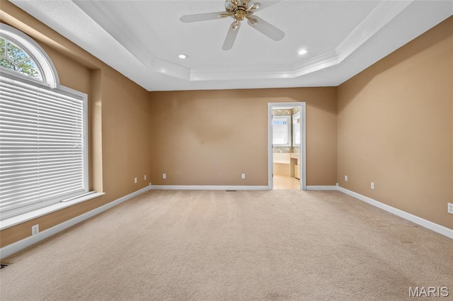 1805 Lincoln Knolls Dr, Edwardsville, IL 62025 - unfurnished room with a tray ceiling, crown molding, a ceiling fan, light colored carpet, and recessed lighting