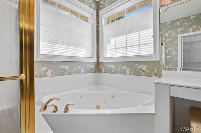 1805 Lincoln Knolls Dr, Edwardsville, IL 62025 - full bathroom with wallpapered walls, plenty of natural light, and a tub with jets