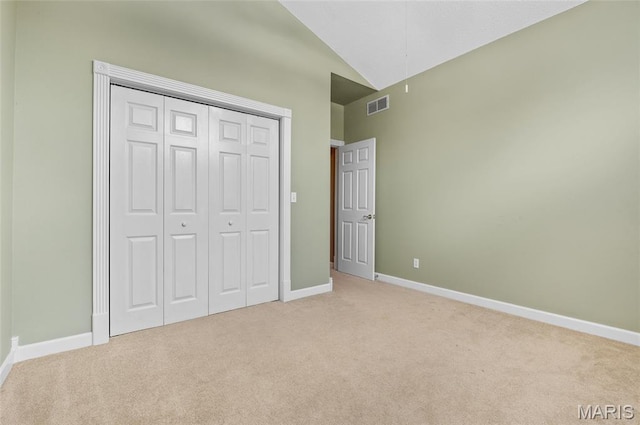 1805 Lincoln Knolls Dr, Edwardsville, IL 62025 - unfurnished bedroom featuring carpet, lofted ceiling, and a closet