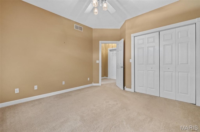 1805 Lincoln Knolls Dr, Edwardsville, IL 62025 - unfurnished bedroom featuring light carpet, a ceiling fan, and a closet