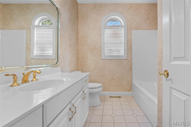 1805 Lincoln Knolls Dr, Edwardsville, IL 62025 - bathroom featuring vanity, healthy amount of natural light, tile patterned floors, and bathing tub / shower combination