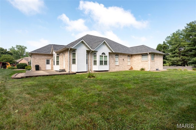1805 Lincoln Knolls Dr, Edwardsville, IL 62025 - back of property featuring brick siding and a shingled roof
