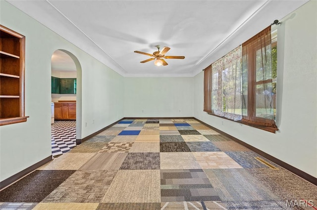 2 Willow Dr, Fairview Heights, IL 62208 - empty room featuring a ceiling fan and arched walkways