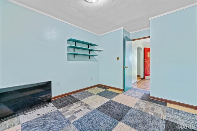 2 Willow Dr, Fairview Heights, IL 62208 - empty room featuring arched walkways and crown molding