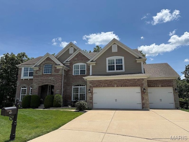 887 Arbor Chase Dr, Wildwood, MO 63021 - traditional-style house with concrete driveway, brick siding, a front lawn, and a garage